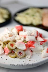 Crab Salad with Pimento Olives is super simple salad is even better the next day which makes it a perfect make ahead item!