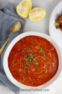 Rich tomato soup with vermicelli pasta and parsley make this extremely simple syrian soup a favorite.