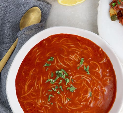 Rich tomato soup with vermicelli pasta and parsley make this extremely simple syrian soup a favorite.